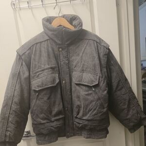 The jacket is from the Hardy Amies London fashion house, a British brand